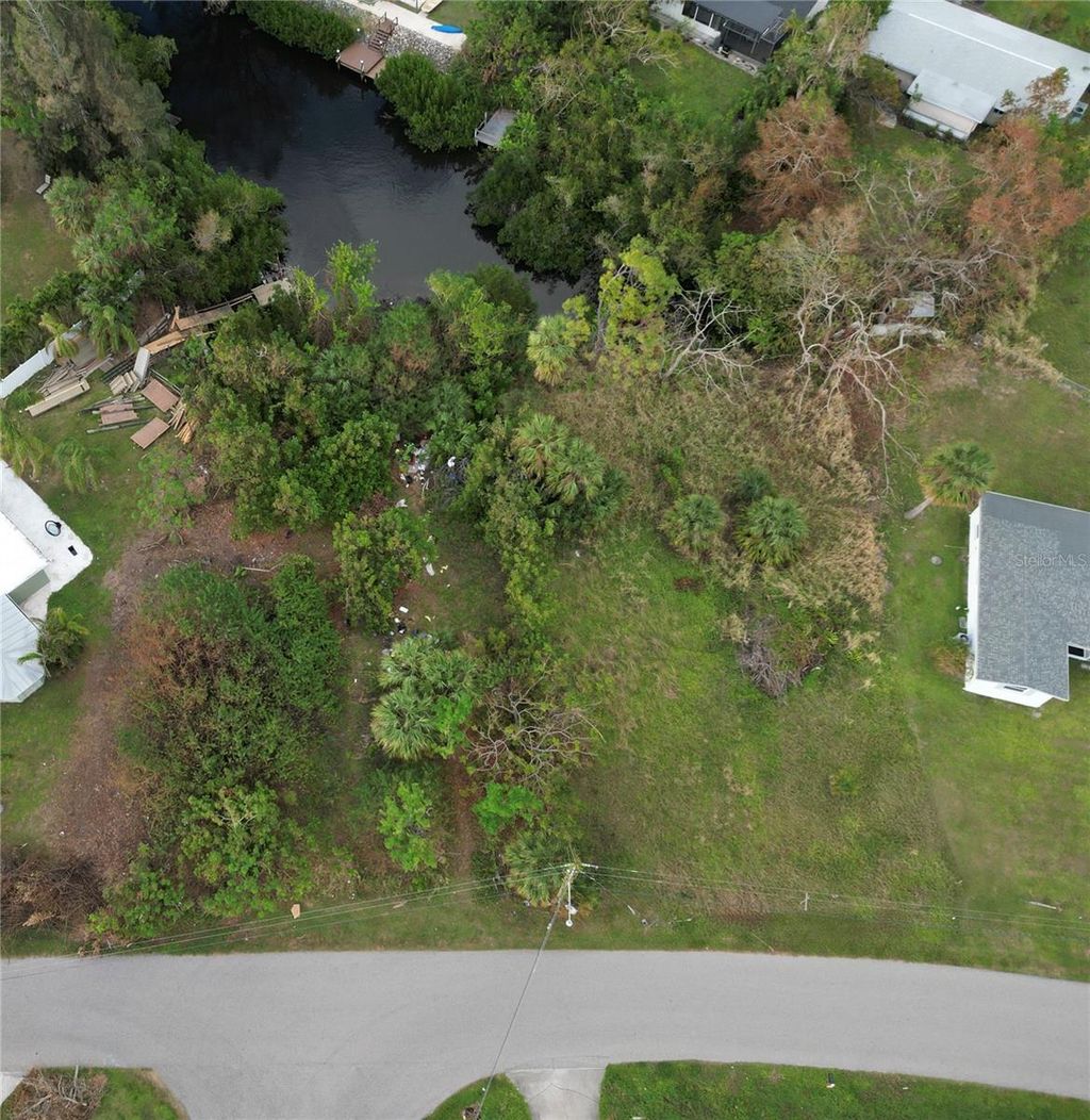 Photo of 108 Barre Drive NW, Port Charlotte, FL 33952 (MLS # A4627778)