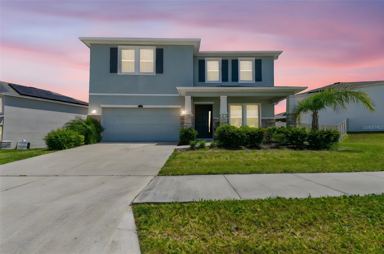 Live the Florida lifestyle in this stunning home of over 3,300sf located in the sought-after lagoon community of Mirada. With its eye-catching curb appeal—complete with stone accents, mature landscaping, and charming, sidewalk-lined streets—this home welcomes you in with style. The open-concept first floor is designed for entertaining, featuring tile flooring throughout, elegant lighting upgrades, crown-molded cabinetry, and an airy, sun-filled atmosphere. The gourmet kitchen boasts sleek stone countertops, stainless steel appliances, a large island with breakfast bar seating, pendant lights, a walk-in pantry, and a cozy dining nook.
A dedicated office, full bathroom, and first-floor bedroom provide flexibility for guests or working from home. Upstairs, enjoy a spacious loft perfect for a second living area, playroom, or media space. Three additional bedrooms and a laundry room add function and convenience, while the expansive primary suite is a true retreat, featuring tray ceilings, a spa-inspired ensuite with soaking tub, dual vanities, walk-in shower, and a large closet.
Don't wait for the builder! This move in ready home includes thoughtful upgrades like a marble backsplash, wood blinds, gutters, electric roller shades, fenced yard, screened-in lanai, and Smart Home tech. Enjoy ULTRAFi high-speed internet, included in the HOA. Best of all, Mirada offers a 15-acre crystal-clear lagoon with sandy beaches, kayaking, paddleboarding, a swim-up bar, and more—truly resort-style living just minutes from I-75, Wesley Chapel, shopping, and dining.