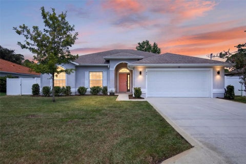 Photo of 27 Porwyn Lane, Palm Coast, FL 32164 (MLS # FC320675)