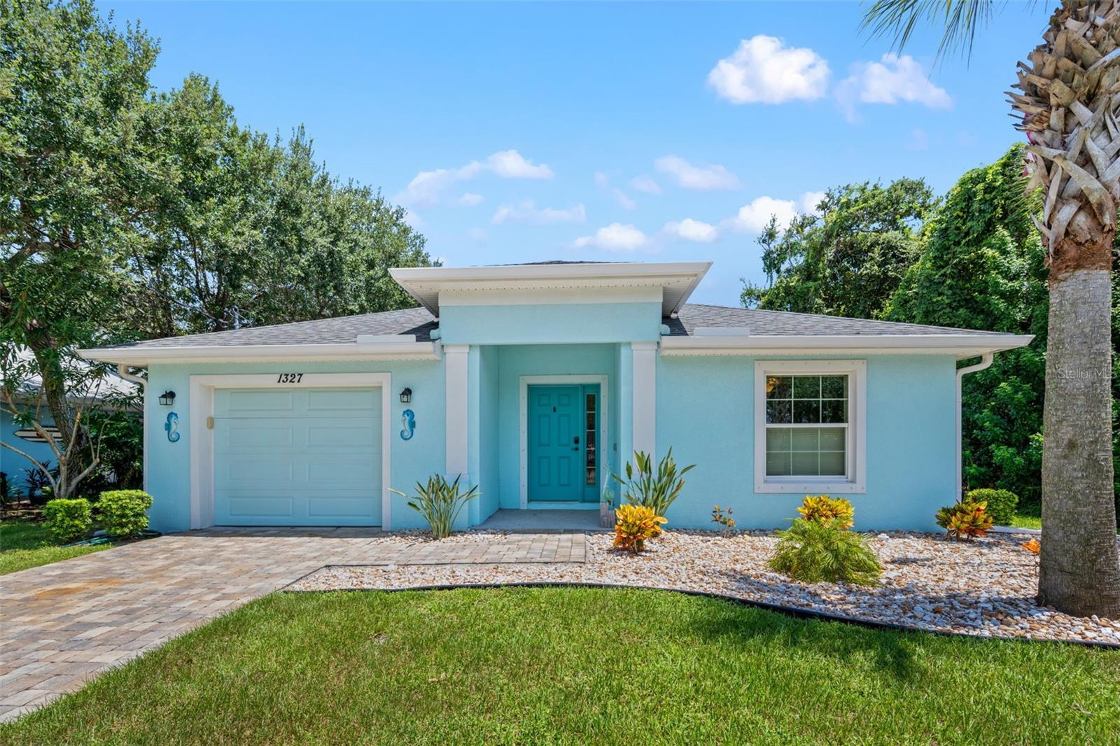 Location, Location, Location!
Discover this ideally situated two-bedroom, two-bath home in the heart of Flagler Beach, Florida. With over 1,200 square feet of living space, this modern residence was built in 2019 and features durable concrete construction with a stylish stucco exterior.
This home is equipped with hurricane shutters for added peace of mind and is located in an X flood zone, providing an extra layer of safety and security. The home also boasts a large rear storage shed with extra parking. Just steps from the beach, you'll find yourself immersed in everything Flagler Beach has to offer. This golf cart-friendly community boasts a vibrant atmosphere, with fantastic restaurants and friendly locals.