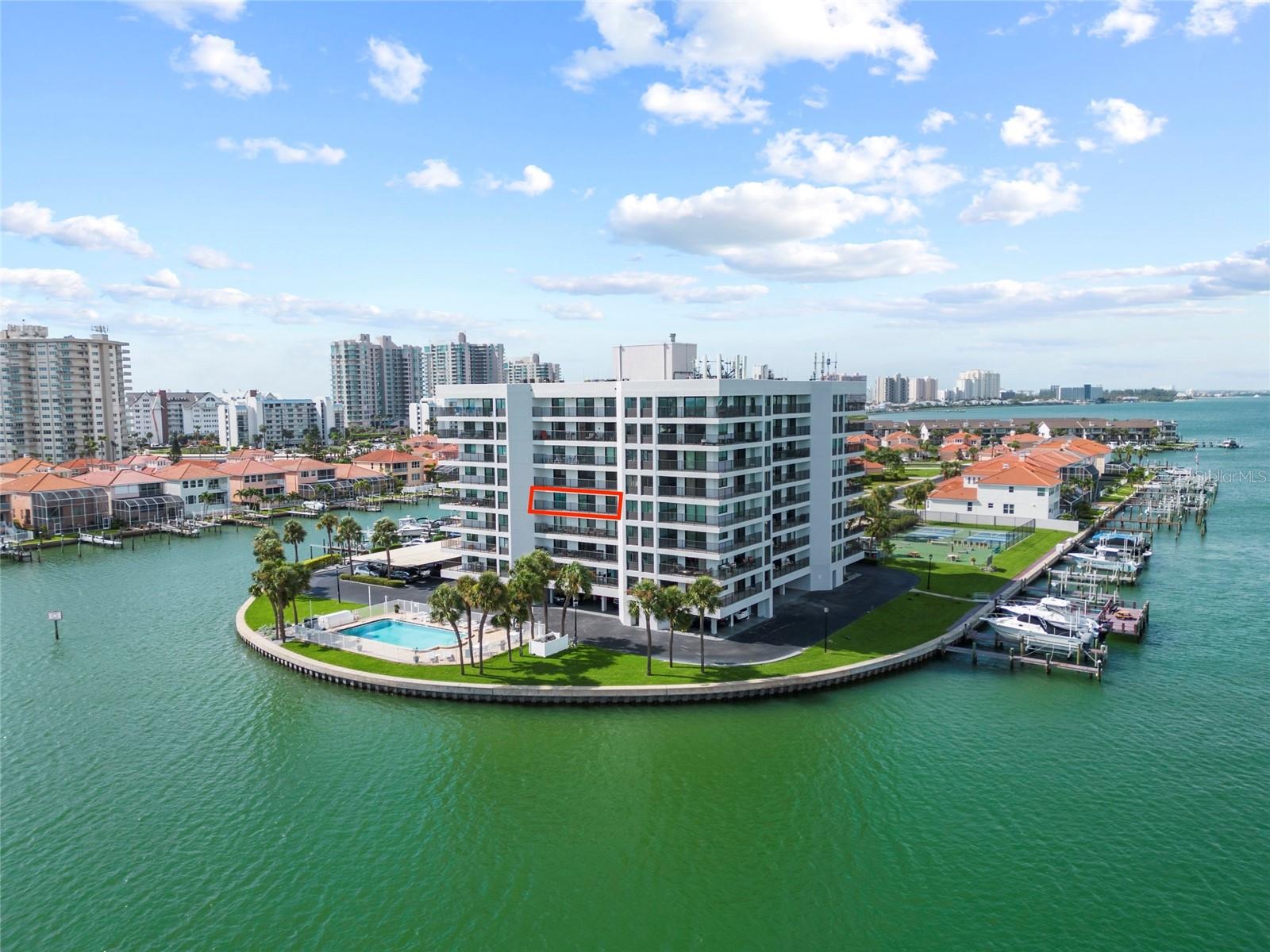 Breathtaking Intracoastal & Gulf Views and DID NOT FLOOD during the worse Hurricane flooding Clearwater beach has ever seen!! This beautifully remodeled 2BR/2BA condo in Harborage II offers stunning water views from every room and unforgettable sunsets daily. Enjoy tropical breezes, a cool drink, and dolphin sightings from your oversized balcony. Direct access to the beach!!
Professionally redesigned with HGTV-inspired touches, this unit features all-new coastal-style engineered wood floors, custom shaker-style cabinetry, and sleek grey-white marble countertops with Brizo lifetime-warranty faucets. The gourmet kitchen includes a brand-new Bosch range, convection microwave, and 3-shelf dishwasher.
The split bedroom layout provides privacy for guests, while the luxurious primary suite includes a double vanity, marble tile, and a walk-in shower. The second bath offers granite counters, marble floors, and a deep soaking tub. Additional highlights include shiplap accent walls, a 6’ built-in electric fireplace, remote-controlled shades, LED recessed lighting with dimmers, smooth drywall ceilings, and upgraded doors and trim. A newer in-unit washer/dryer adds convenience.
Enjoy covered parking, a large storage unit, and resort-style amenities including a heated pool, pickleball, shuffleboard, fishing pier, BBQ grills, and picnic area. Boat slips available for rent or purchase. Pet-friendly (2 small pets allowed). Harborage II has recently completed a full building renovation and is located in a 24/7 guard-gated Sand Key community—just steps from the white sand beaches and Gulf of Mexico. Schedule your private showing today!