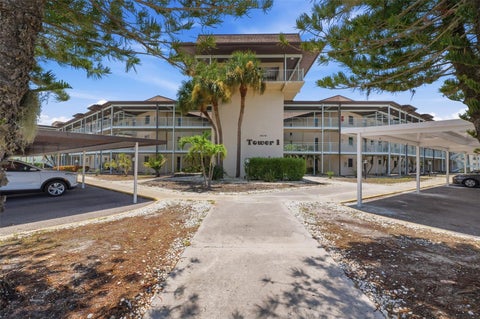 Photo of 4678 Marine Parkway #105, New Port Richey, FL 34652 (MLS # W7887991)