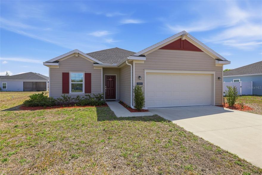 Welcome home to comfort, connection, and a little slice of North Florida charm! Nestled within a thoughtfully designed new development, this beautifully maintained home offers a true turn-key lifestyle with a cohesive neighborhood feel—no guesswork, no surprises, just easy living from day one.  This 3/2 home packs a punch!  Step inside to discover a bright, open floor plan enhanced with smart-enabled features, including a tankless water heater, irrigation system, and a full Ring security suite with doorbell, alarm, and AI-powered camera technology—giving you peace of mind around the clock. Perched at the top of an incline, this property stands out as the only home currently available with exceptional spacing between neighbors in Country Lane Estates—offering both privacy and room to breathe. The community itself is known for its quiet, friendly, and family-oriented atmosphere, where neighbors truly look out for one another.  This home has been carefully enhanced for durability, comfort, and style:  Elegant, high-end tile flooring throughout all bedrooms—cool underfoot, low maintenance, and built to last. 
Professionally tinted windows blocking up to 99% of UV rays—helping reduce energy costs, protect interiors, and enhance privacy. Upgraded stainless steel hardware, fully painted interiors (including ceilings), and refined finishes throughout.  Cleaned AC ductwork, full home sealing and caulking for efficiency, plus added lighting and ceiling fans for comfort.  A Naturally Protected Setting; Situated in a unique microclimate, this home benefits from a location long regarded as a “safe haven” during seasonal weather—adding an extra layer of reassurance to your investment.  Enjoy the best of small-town living with big-time charm:  A quick drive to everyday conveniences like shopping, dining, and essentials.  Easy access to stunning natural attractions, outdoor adventures, and scenic landscapes. Spend weekends exploring local favorites like Homestead Park—a lively, pet-friendly destination featuring unique shops, local eats, live entertainment, farmers markets, and fun activities from yoga to mini golf.  Adventure is always within reach—whether you're picking fresh berries at local farms or exploring Florida’s natural beauty at nearby gems like Cedar Lakes Woods & Gardens, Paynes Prairie Preserve State Park, Devil's Den Prehistoric Spring, and Rainbow Springs State Park.  When you’re craving a coastal escape, the charming Gulf town of Cedar Key is just 45 minutes away—perfect for weekend getaways filled with nature, seafood, and Old Florida charm.  This isn’t just a house—it’s a lifestyle defined by comfort, community, and the beauty of simpler living. Come experience why this home—and Williston—are so easy to fall in love with.
