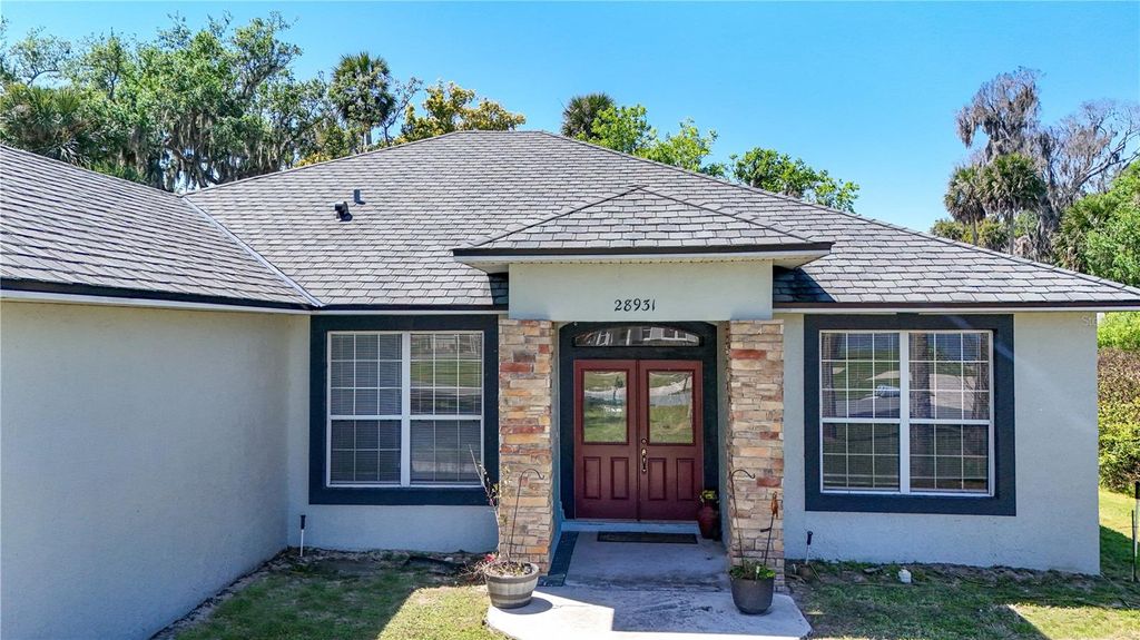 Photo of 28931 Beauclaire Drive, Tavares, FL 32778 (MLS # G5110108)