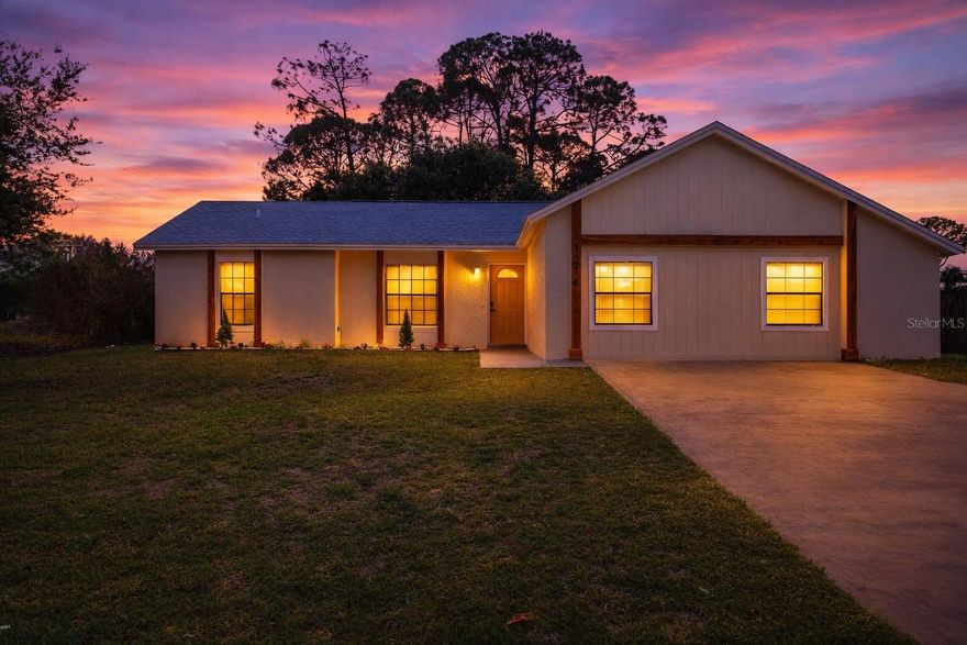 Welcome to this beautifully renovated 4-bedroom, 3-bathroom single-family home offering modern upgrades, a functional layout, and exceptional value. This move-in-ready property has been thoughtfully updated and is perfectly located in a centralized area close to major shopping centers, restaurants, schools, and just a short drive to Florida’s beautiful beaches.

The home features a bright and open floor plan with abundant natural light, vinyl flooring throughout, and contemporary finishes. The fully remodeled kitchen offers stainless steel appliances, updated cabinetry, and modern fixtures, with a functional design that flows seamlessly into the main living areas, creating a comfortable and inviting space perfect for everyday living and entertaining.
The spacious bedrooms provide flexibility for families, guests, or even a home office. Situated on an oversized 0.42-acre lot, the large backyard offers endless possibilities for outdoor living, entertaining, gardening, or future improvements.

Additional features include central air conditioning, public sewer, public water, a 2025 shingle roof, and NO HOA or CDD, providing added flexibility and fewer restrictions. For additional peace of mind, the property also includes a 1-year home warranty.
Conveniently located near shopping, dining, schools, and major roadways, this property offers the perfect combination of comfort, location, and value.

Don't miss this opportunity to own a fully updated home on a large lot. Schedule your private showing today.