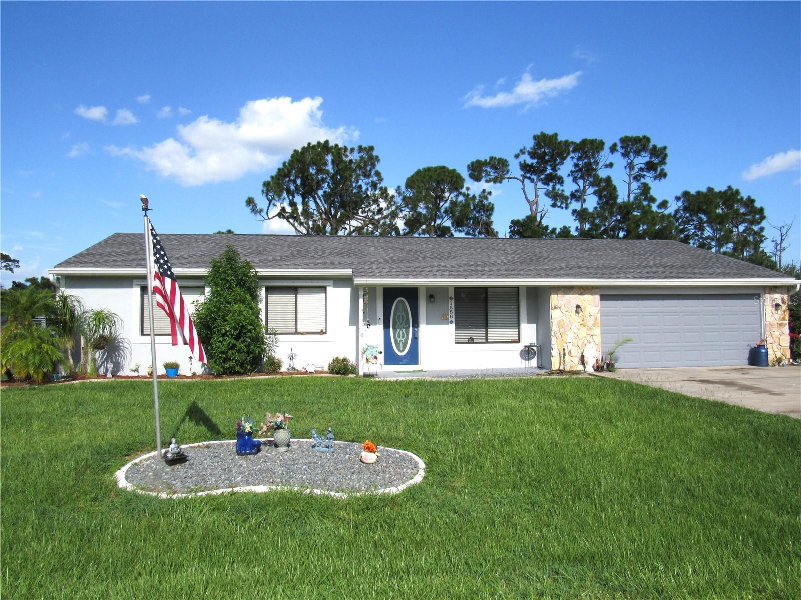 This well maintained, 3 bedroom, 2 bath home is situated on a freshwater canal and is ready for you to move right in! Public water and sewer and no HOA fees! With luxury vinyl flooring throughout, this plan features an additional 20x11 bonus room (air conditioned by wall unit which could easily be converted), which has sliders out to the 16 x 11 deck overlooking the large, fully fenced back yard and on to the serene water view. Enjoy fishing or canoeing on the Niagra Waterway and be entertained by the birds and wildlife provided by Mother Nature. The roof was replaced in 2023. hurricane shutters installed in 2024, and electrical panel replaced in 2015. The solar system was installed in November, 2024. All this in a great location near many amenities including restaurants, shopping, schools, medical facilities, parks, golf courses and easy access to I-75. Historic Downtown Punta Gorda, Fisherman's Village, Sunseeker Resort and gulf beaches are just a short drive away.