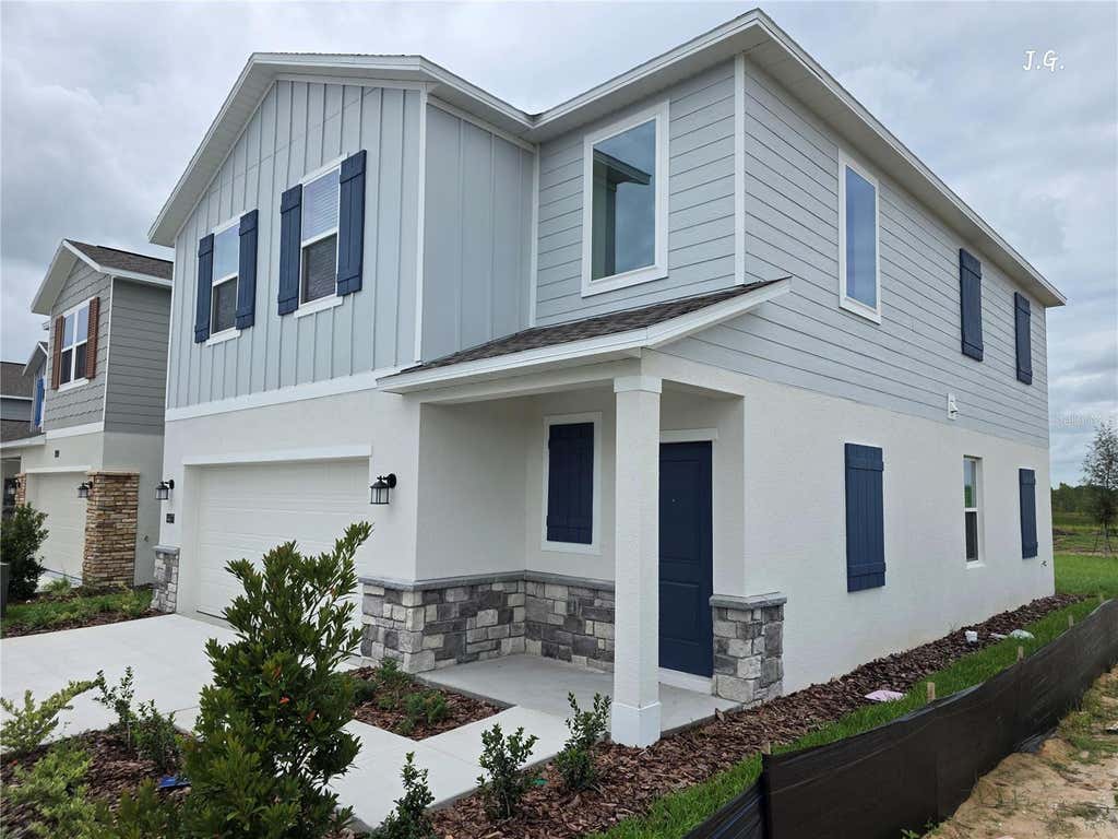 Photo of 4417 River Beacon Boulevard, Davenport, FL 33897 (MLS # O6435014)