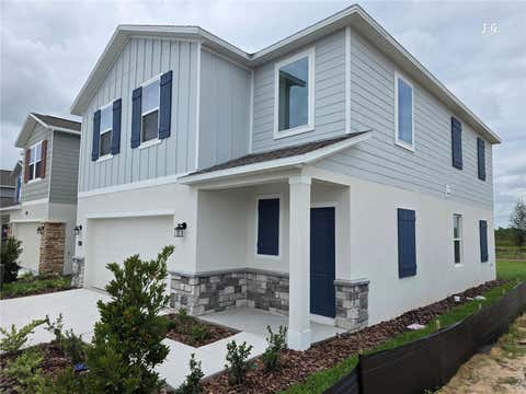 Photo of 4417 River Beacon Boulevard, Davenport, FL 33897 (MLS # O6435014)