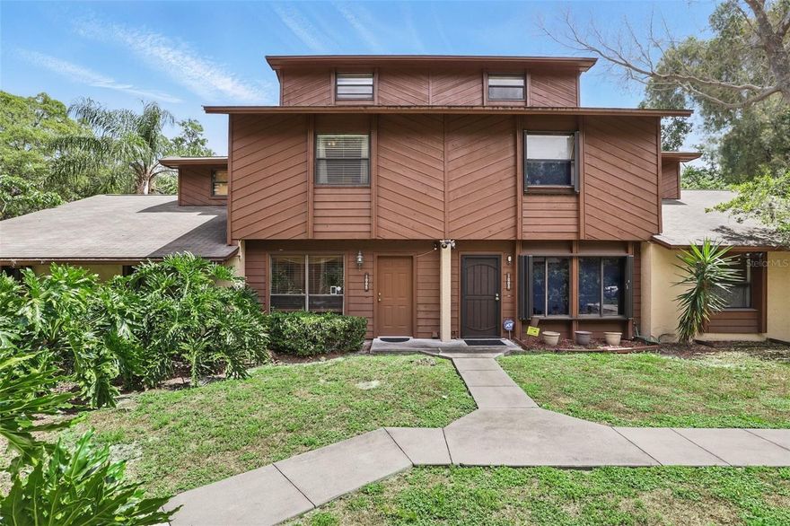 Back on the market! Previous buyer fell through last minute! Appraisal and inspection were satisfactory! Seller is including a home warranty with an acceptable offer. Great location and your own private fenced YARD! Driving into this lovely community, you'll notice the brick paver streets and majestic oaks. You'll feel like you're tucked away from the hustle and bustle, but be just minutes from everything! The unique and charming townhouse-style condo has spacious living areas, roomy bedrooms and even features a beautiful fenced-in backyard retreat. This property has been meticulously maintained and it shows! Entering into the foyer, you'll appreciate the spacious living room and high quality laminate, wood-look flooring that continues throughout the downstairs. The generously-sized family room has attractive french doors leading out to the adorable woodsy backyard, which features a deck, stone path and multiple plants. The kitchen has a gas range (the water heater is also gas) and a breakfast bar over looking the comfortable family room. Brand new dishwasher! The spacious primary bedroom has dual closets and enough room for a seating area. The secondary bedroom features an updated bath and a very large closet that spans the width of the room. Just off the bedrooms, there are pull down stairs that lead to a HUGE loft and storage area. Others in the community have converted this area into a third floor loft (currently not included in the square footage) So many possibilities! You can't beat the location, just off Thompson and just minutes from a plethora of restaurants and shopping!