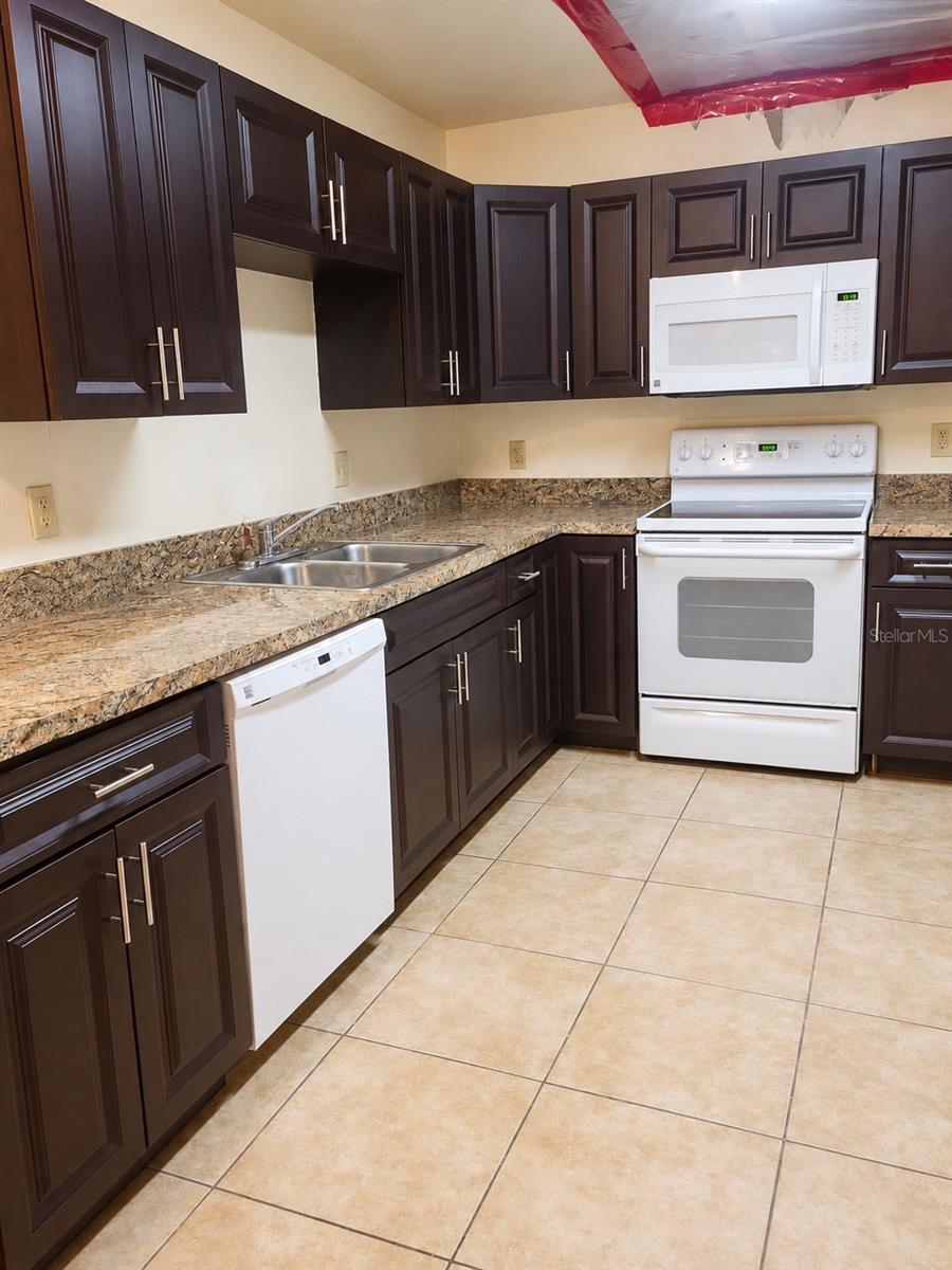 Photo of 6000 Scotchwood Glen #107, Orlando, FL 32822 (MLS # O6446601)