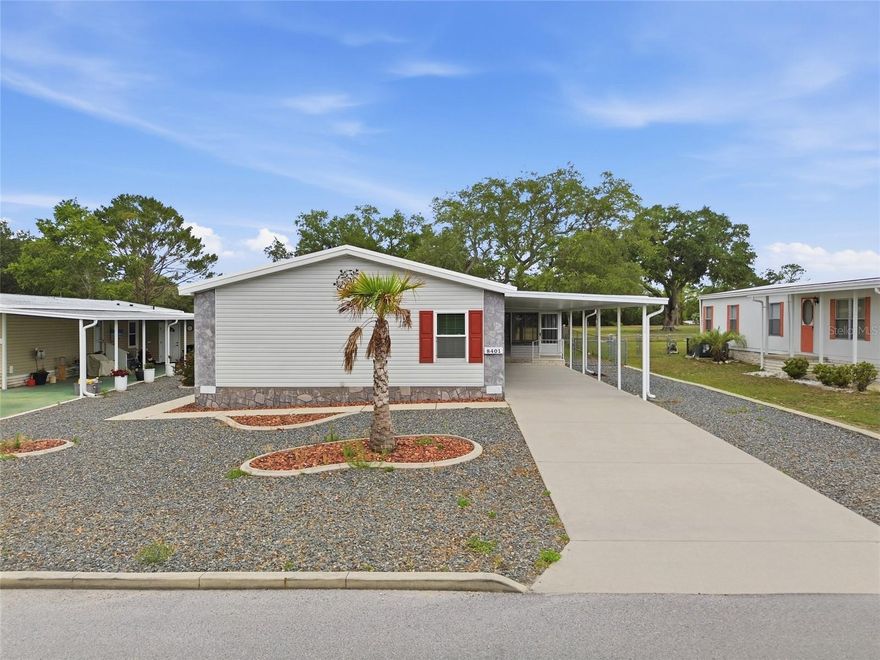 A MUST SEE! 
Welcome home to this charming 3-bedroom, 2-bath retreat overlooking the golf course in the vibrant 55+ Brookridge community. Here, you own your land, enjoy a low monthly HOA fee, and live in a neighborhood known for its friendly atmosphere and endless activities.

Inside, the home opens to a bright, airy split floor plan with a gorgeous island kitchen at the heart of it all. The spacious living room, complete with a cozy electric fireplace, is perfect for relaxing or hosting friends. Has an open dining room for all your family gatherings. You’ll love the thoughtful touches throughout—custom window coverings, indoor laundry, a water softener system, exhaust fans, and major updates like a 2024 membrane roof and Trane A/C (2017).

The Florida room is a true highlight, offering custom shades, a portable A/C unit, and peaceful views of the sunsets and golf course. For hobby lovers, the 16x27 workshop with a roll-up door and its own A/C unit is a dream come true.

Outside, the fenced backyard features a lovely shade tree, and the two-car carport and stone-accented front yard add curb appeal and convenience.