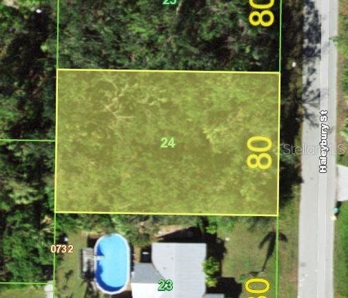 Build your dream home on this spacious vacant lot located at 742 Haleybury Street, Port Charlotte, FL. Nestled in a quiet residential neighborhood, this property offers the perfect blend of privacy and convenience. With no HOA or deed restrictions, you’ll have the freedom to design the home and lifestyle you’ve been envisioning. Power lines pass by the property and the property will need a well and septic