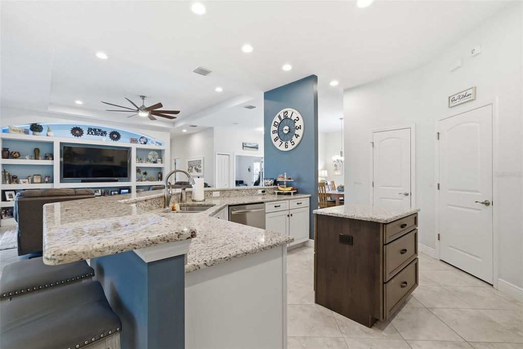 Photo of 3840 Cardenal Avenue, Sun City Center, FL 33573 (MLS # TB8498321)