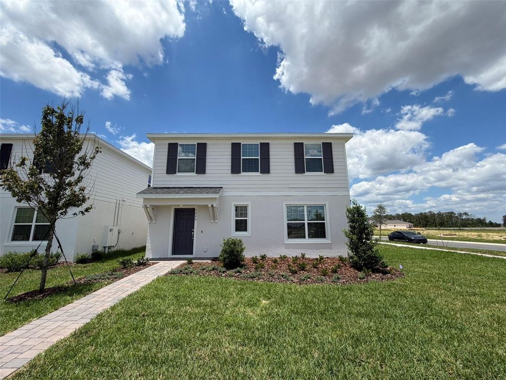 Photo of 5646 Enchanted Meadow Aly Mdw, Clermont, FL 34714 (MLS # O6408345)