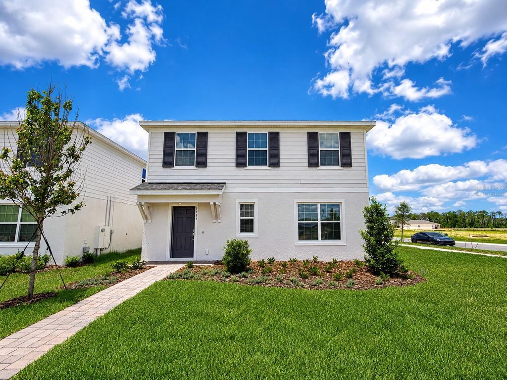 Photo of 5646 Enchanted Meadow Aly Mdw, Clermont, FL 34714 (MLS # O6408345)