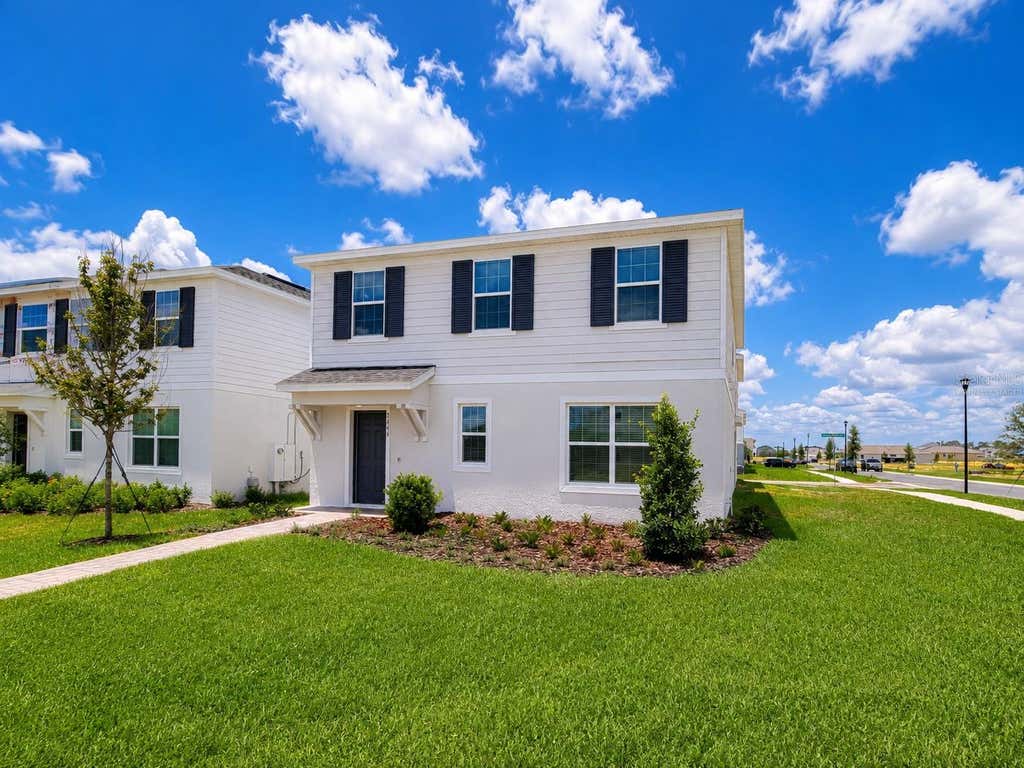 Photo of 5646 Enchanted Meadow Aly Mdw, Clermont, FL 34714 (MLS # O6408345)