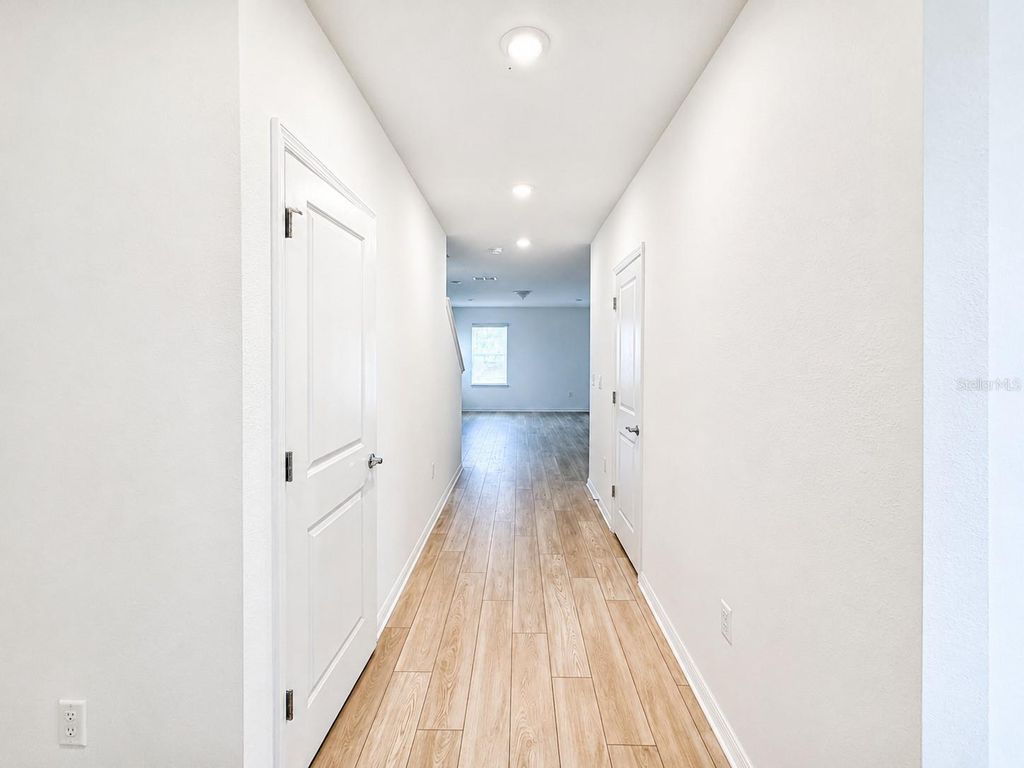 Photo of 5646 Enchanted Meadow Aly Mdw, Clermont, FL 34714 (MLS # O6408345)