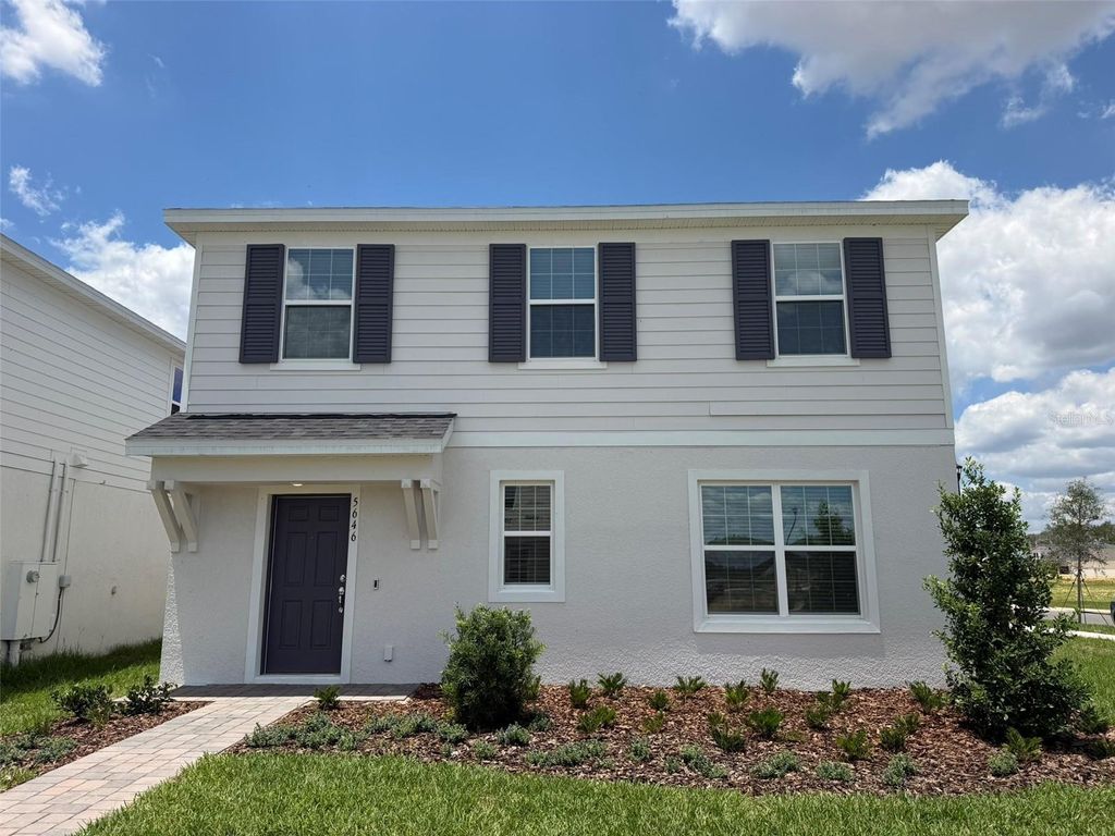 Photo of 5646 Enchanted Meadow Aly Mdw, Clermont, FL 34714 (MLS # O6408345)