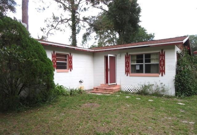 Charming 1-Story Block Home on Nearly Half an Acre – Great Potential!
Don't miss this opportunity to own a spacious 2-bedroom, 1-bath home in a country-like setting. The formal living and dining rooms feature hardwood flooring, creating an inviting space for gatherings. The kitchen leads directly to a convenient laundry area. A versatile bonus room with ceramic tile flooring offers additional living space that can be converted into a home office space.
Situated on a fenced, oversized lot of almost half an acre, this property includes a well and septic system. Additional features include a large storage closet, a detached shed, and a workshop—ideal for storage or hobbies.
This property is being sold in As-Is condition. Bring your vision and transform this home into your idea retreat.
Schedule your showing today before it's gone!