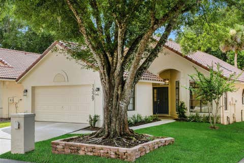 Photo of 1329 Augusta National Boulevard, Winter Springs, FL 32708 (MLS # O6422133)