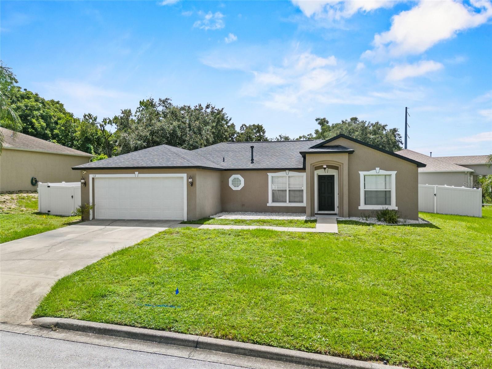 Welcome to this beautifully upgraded 3-bedroom, 2-bath home situated on a premium corner lot, just minutes from the recreational trails, playgrounds, and community events at Lake Eva Park. From the moment you step inside, you’ll appreciate the inviting open-concept design, enhanced by granite countertops, and warm wood accents that add character and charm.
The spacious primary suite offers a true retreat, complete with double vanities, a private dressing area, and plenty of natural light. The split-bedroom layout ensures privacy for family or guests.
Step outside to enjoy Florida living at its best: a screened lanai overlooks the expansive fully fenced backyard, perfect for pets, gardening, or parking your boat. A 12x14 shed provides generous storage space for tools, equipment, or hobby gear.
This home comes with peace of mind thanks to thoughtful recent updates, including a new roof (2021), new A/C (2024), and new flooring (2023). Energy efficiency is enhanced with natural gas service for the water heater, stove, and dryer.
Located just off Highway 27 and I-4, you’ll have quick access to shopping, dining, and commuting routes while still enjoying the quiet comfort of a neighborhood setting.