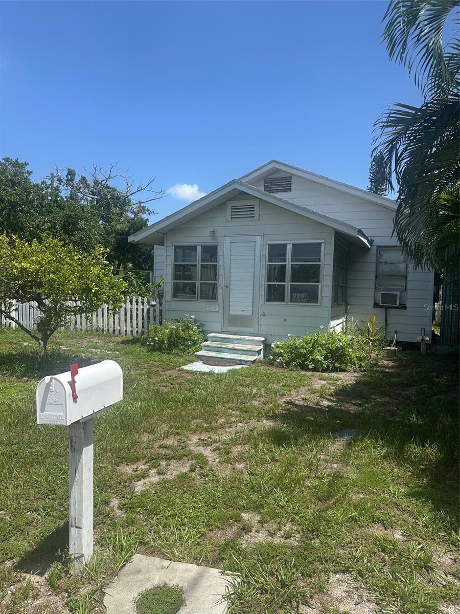 INVESTOR ALERT! Close to the exciting forthcoming City Park and revitalization on 9th Street surrounding LECOM park. Walking distance to the ball park for Pirates and Marauders games or enjoy the offerings of the burgeoning Entertainment District and the Village of the Arts. With vision and ability, you can bring this old bungalow back to it's glory or build new.