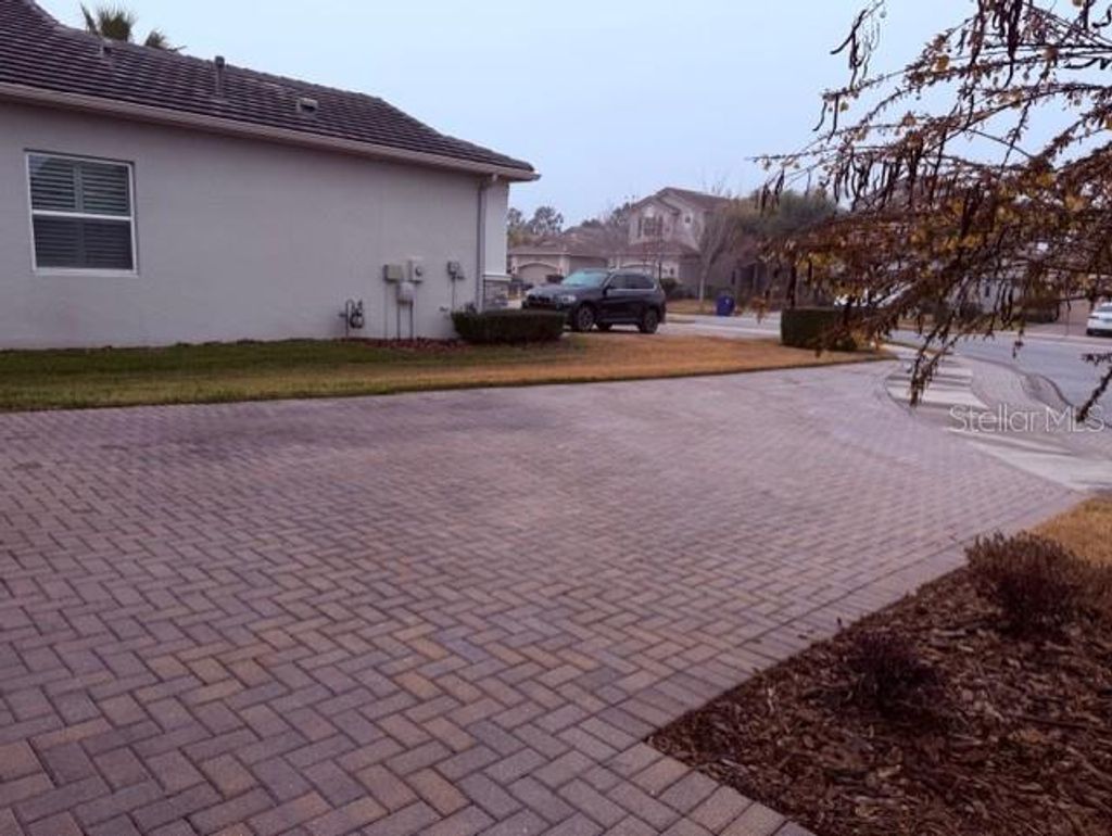 Photo of 2864 Tarragona Way, Wesley Chapel, FL 33543 (MLS # O6386213)