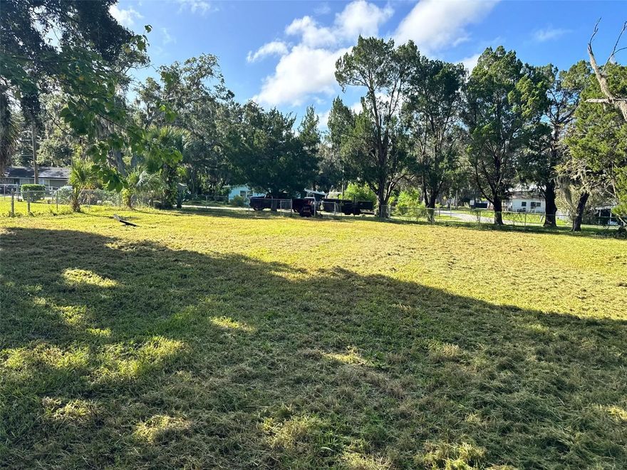 Buildable Duplex Lot — Utilities Ready — Income Potential.  Opportunity to build a primary residence or income-producing property on this oversized 100 x 150 lot (approximately 1/3 of an  acre) located on Lorenzen Road in Port Richey. Zoned R-2, this property allows for either a single-family home or duplex, offering flexibility for both end users and investors.
Public water and sewer are already connected, providing significant upfront savings. The lot is fully fenced and sits at an elevation of approximately 11 feet. No HOA or CDD fees. Survey available.
Conveniently located just minutes from US-19, shopping, dining, public transportation, medical facilities, and the Gulf beaches. Easy access to major roads makes commuting simple while still offering a residential setting.
A rare opportunity to acquire a buildable lot with utilities in place in an established area of Port Richey—ideal for new construction or investment development.