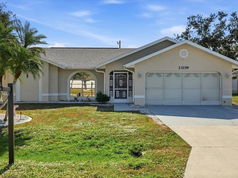 Photo of 23259 Safari Avenue, Port Charlotte, FL 33954 (MLS # C7518151)