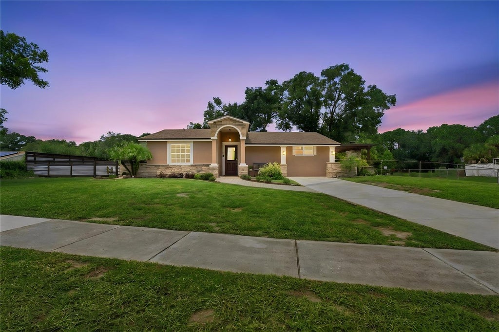 Photo of 9020 Auburn Way, Tampa, FL 33615 (MLS # TB8541370)
