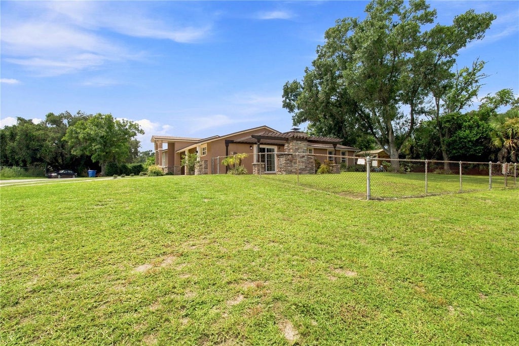 Photo of 9020 Auburn Way, Tampa, FL 33615 (MLS # TB8541370)