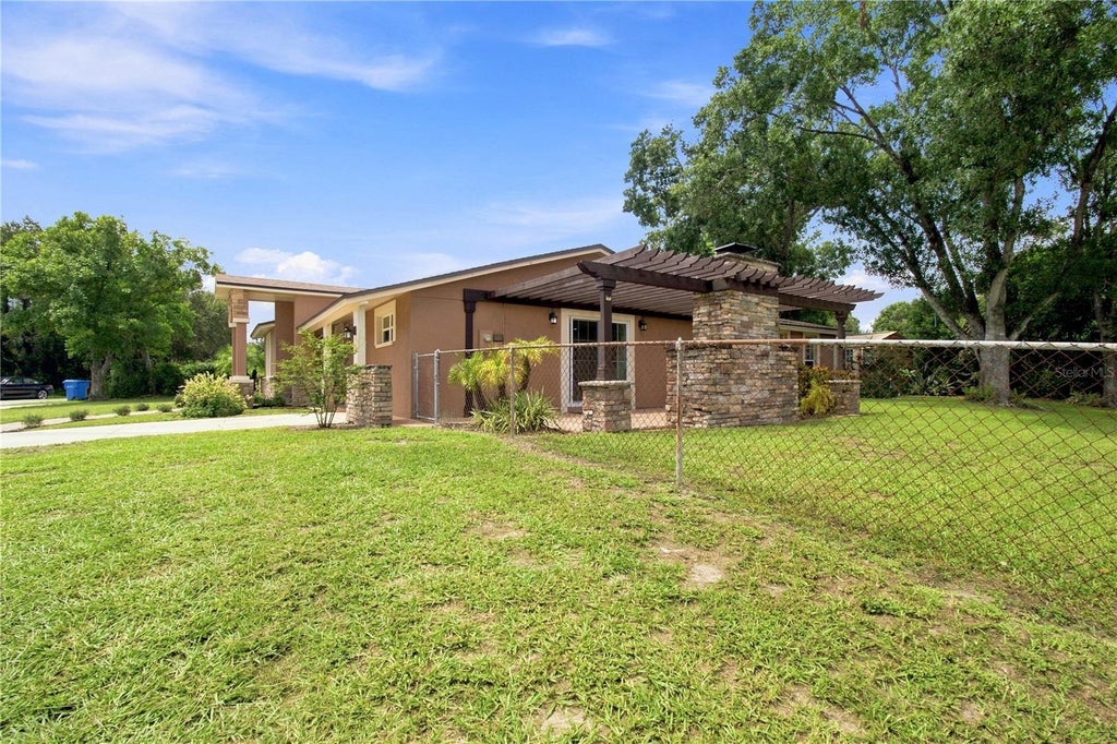 Photo of 9020 Auburn Way, Tampa, FL 33615 (MLS # TB8541370)