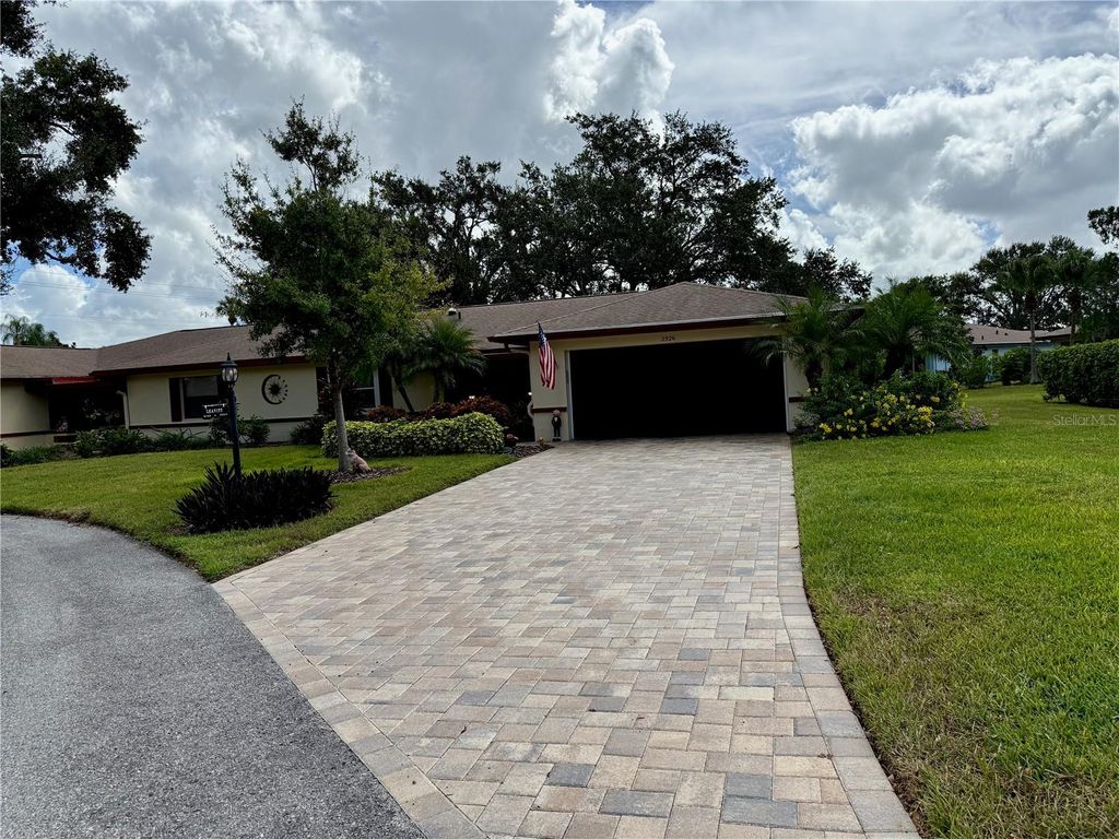 Photo of 2526 Lonigan Place, Sun City Center, FL 33573 (MLS # TB8431821)