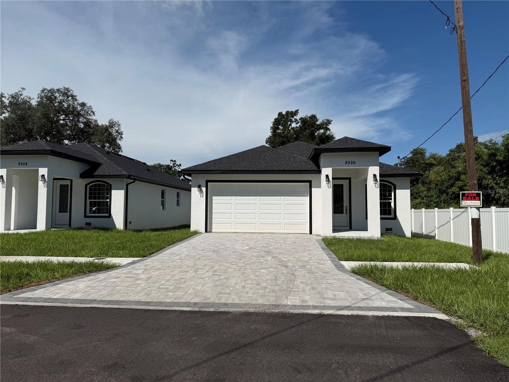 Photo of 8926 N Orleans Ave, Tampa, FL 33604 (MLS # TB8547050)