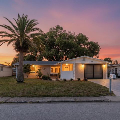 Photo of 3338 Hoover Drive, Holiday, FL 34691 (MLS # TB8493526)