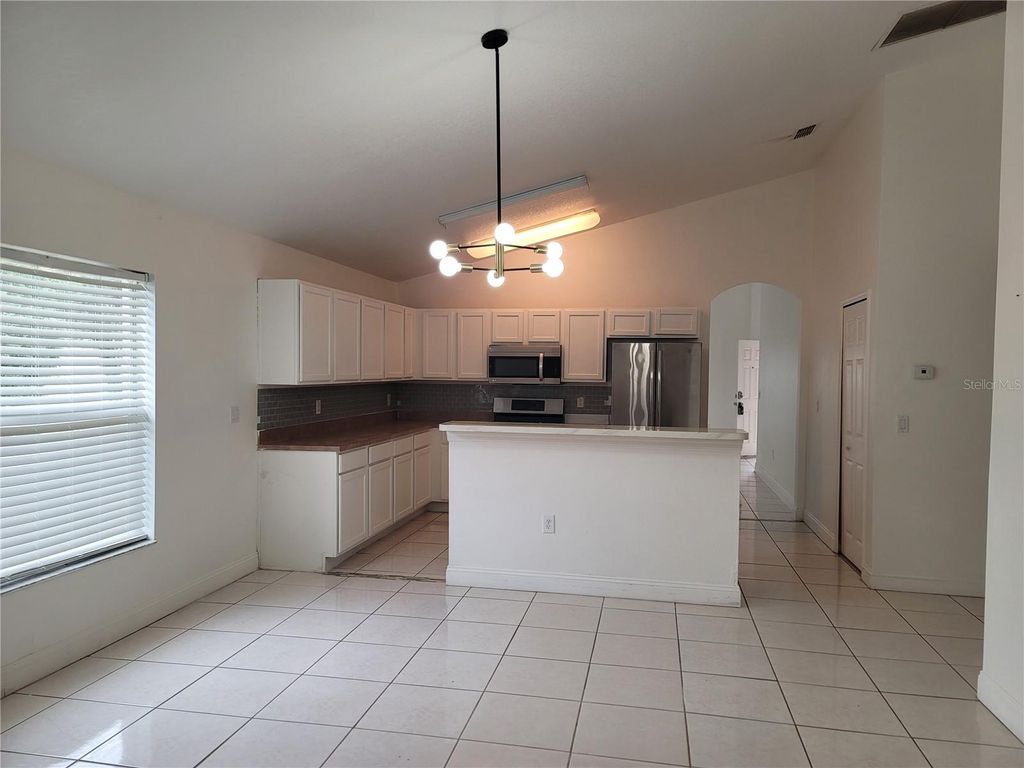 Photo of 601 Astor Drive, Haines City, FL 33844 (MLS # O6374804)