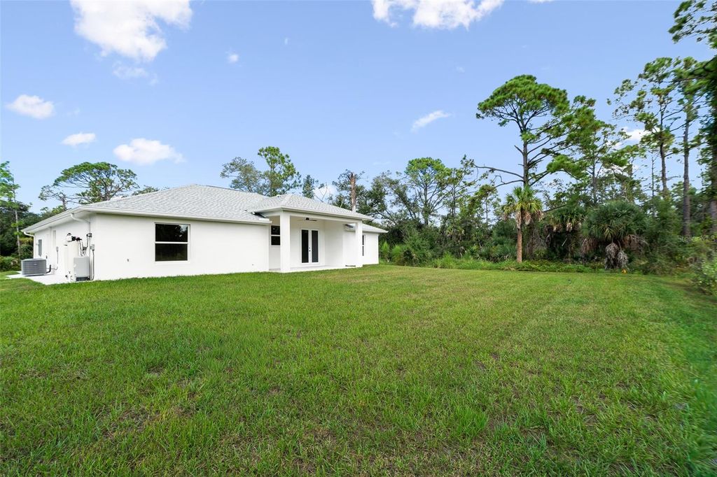 Photo of 98 Heather Street, Port Charlotte, FL 33953 (MLS # C7515982)