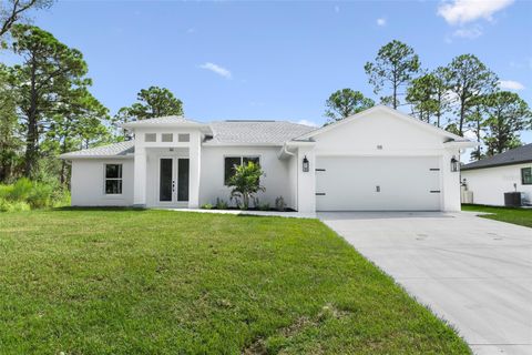 Photo of 98 Heather Street, Port Charlotte, FL 33953 (MLS # C7515982)
