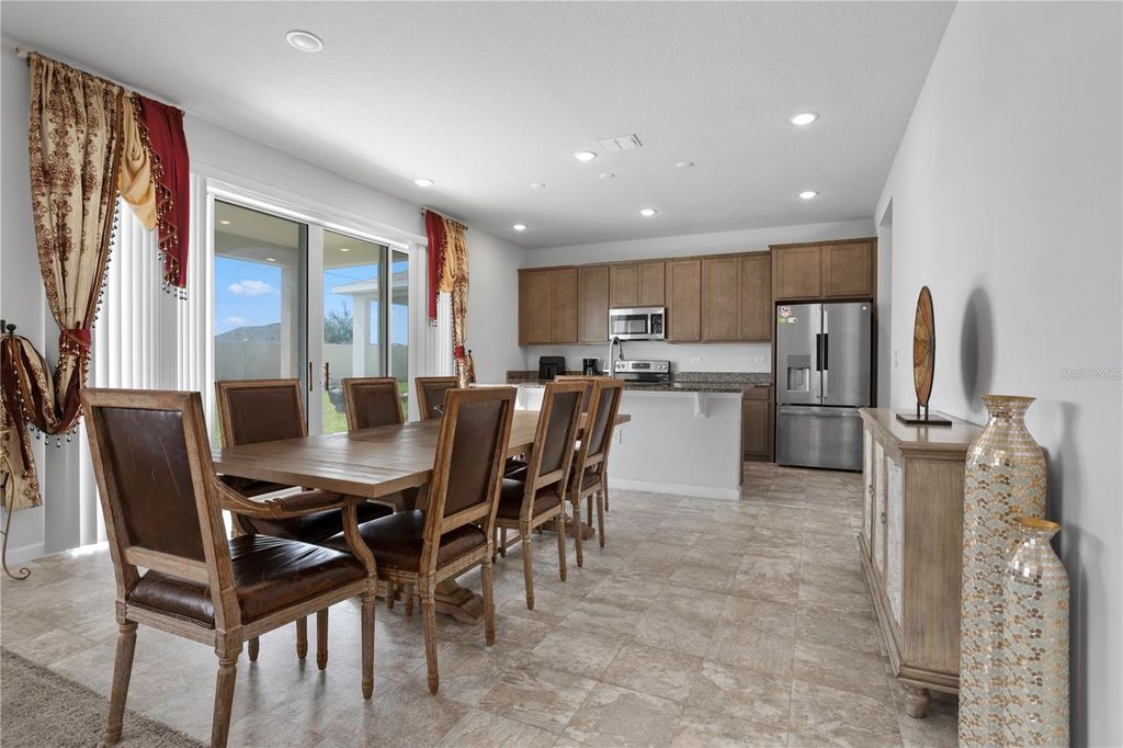 Photo of 1076 Sugarwood Street, Davenport, FL 33837 (MLS # O6363234)