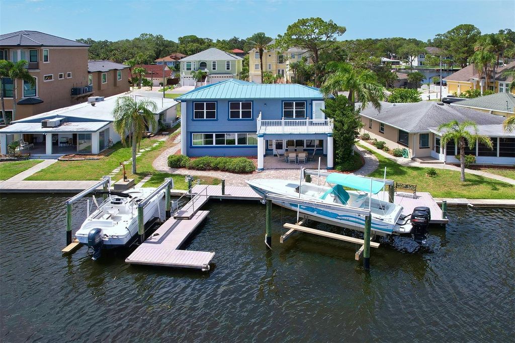 Photo of 5449 Manatee Point Drive, New Port Richey, FL 34652 (MLS # TB8376557)