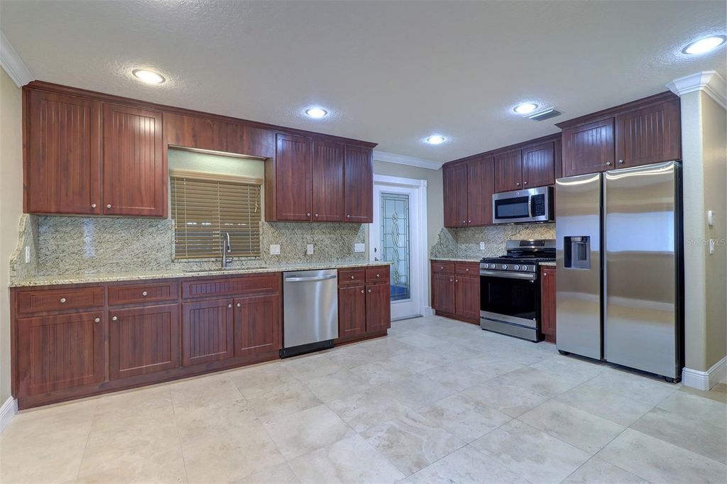 Photo of 5449 Manatee Point Drive, New Port Richey, FL 34652 (MLS # TB8376557)