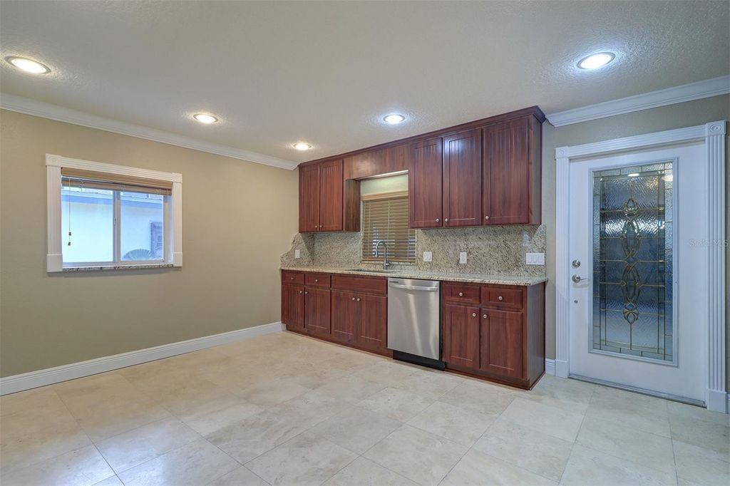 Photo of 5449 Manatee Point Drive, New Port Richey, FL 34652 (MLS # TB8376557)