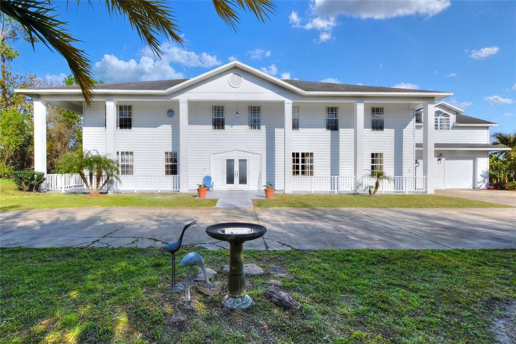 Photo of 2653 State Road 557, Lake Alfred, FL 33850 (MLS # L4959282)