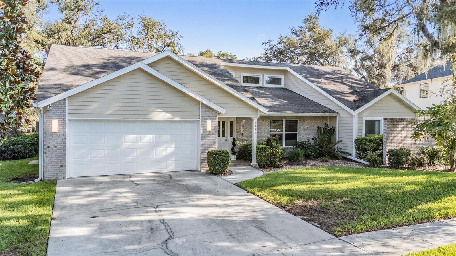 Welcome to 1204 Moondale Ct., a meticulously maintained 3-bedroom, 2-bath pool home on a quiet cul-de-sac in the highly desirable Bloomingdale community of Valrico. Known for its top-rated schools, mature tree-lined streets, and unbeatable location, Bloomingdale is one of the most sought-after neighborhoods in the area—and this home delivers. Step inside to vaulted ceilings, abundant natural light, and a well-designed split-bedroom floor plan. Multiple living and dining spaces offer flexibility, while neutral finishes make it move-in ready. The kitchen has been tastefully updated with newer cabinetry, countertops, and appliances—offering a fresh, functional space at the heart of the home. Sliders open to a screened lanai and private pool, surrounded by a fenced backyard with plenty of room to entertain, unwind, or soak up the Florida sunshine. The primary suite features a walk-in closet and private en suite bath. Two additional bedrooms and a second full bath are tucked away on the opposite side of the home for added privacy. The two-car garage includes laundry and additional storage.
With no CDD, optional HOA, and a location close to parks, golf, dining, and shopping—this lovingly cared-for home is a rare opportunity in one of Valrico’s most established communities.