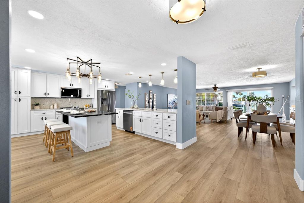 Photo of 6410 3rd Palm Point, St Pete Beach, FL 33706 (MLS # TB8360644)