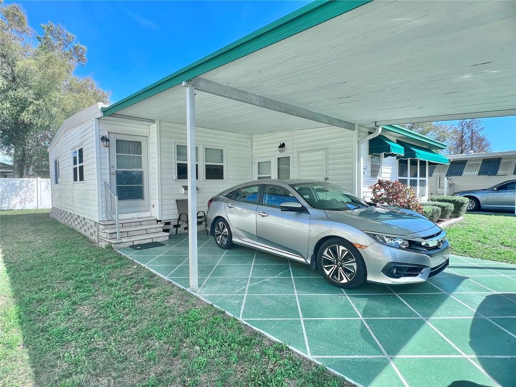 Photo of 1100 Belcher Road S #8, Largo, FL 33771 (MLS # TB8485268)