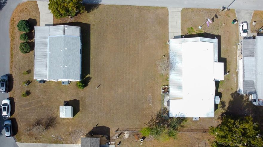 Vacant lot cleared and ready for a buyer in this large mobile home park. Utilities available. This vacant .16-acre residential lot offers a great opportunity to build your next home. The parcel is separately deeded and can be purchased on its own or ideally together with the adjacent property at 4550 Charter Street (MLS # TB8480566). Conveniently located with easy access to local amenities, shopping, and major roadways. No HOA or CDD. Ideal for builders, investors, or buyers looking to secure land in a growing area. Buyer to verify all zoning, land use, and building regulations. Opportunities like this don’t come along often, secure your piece of land today and start planning your next move!