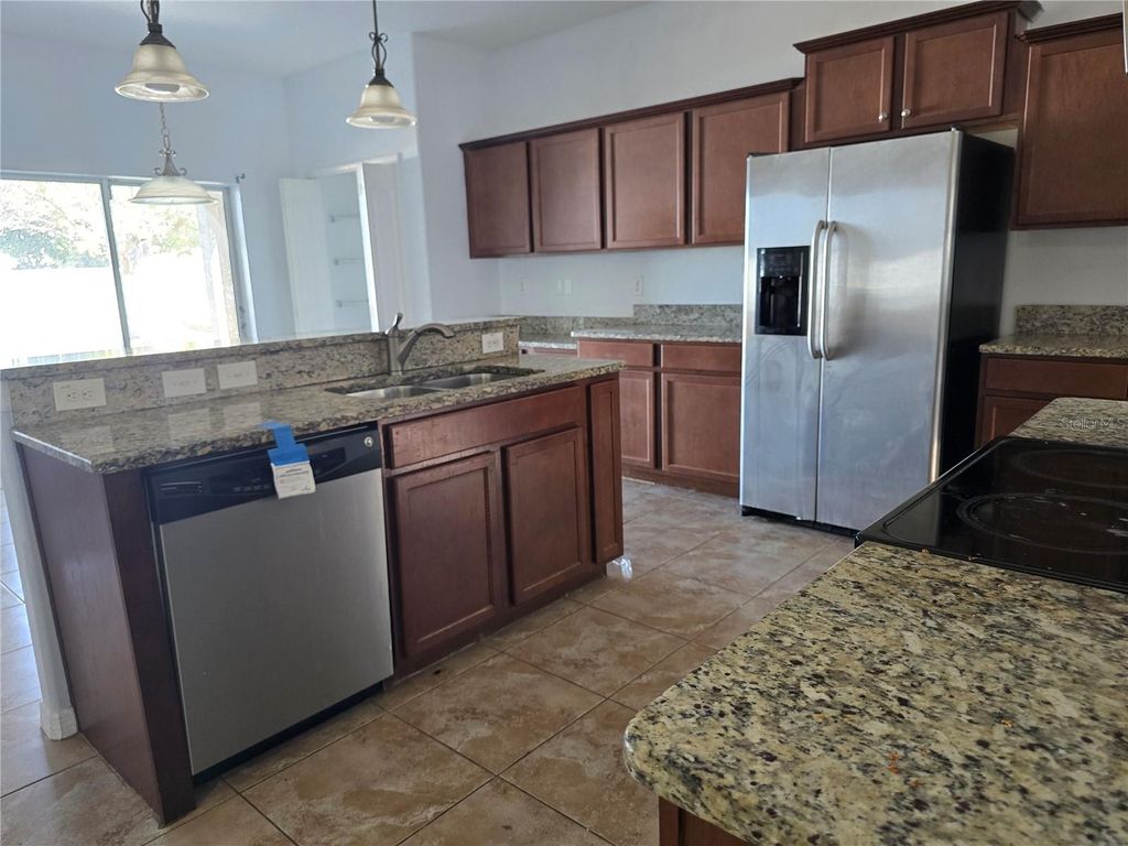 Photo of 1803 Palm Warbler Lane, Ruskin, FL 33570 (MLS # TB8476407)