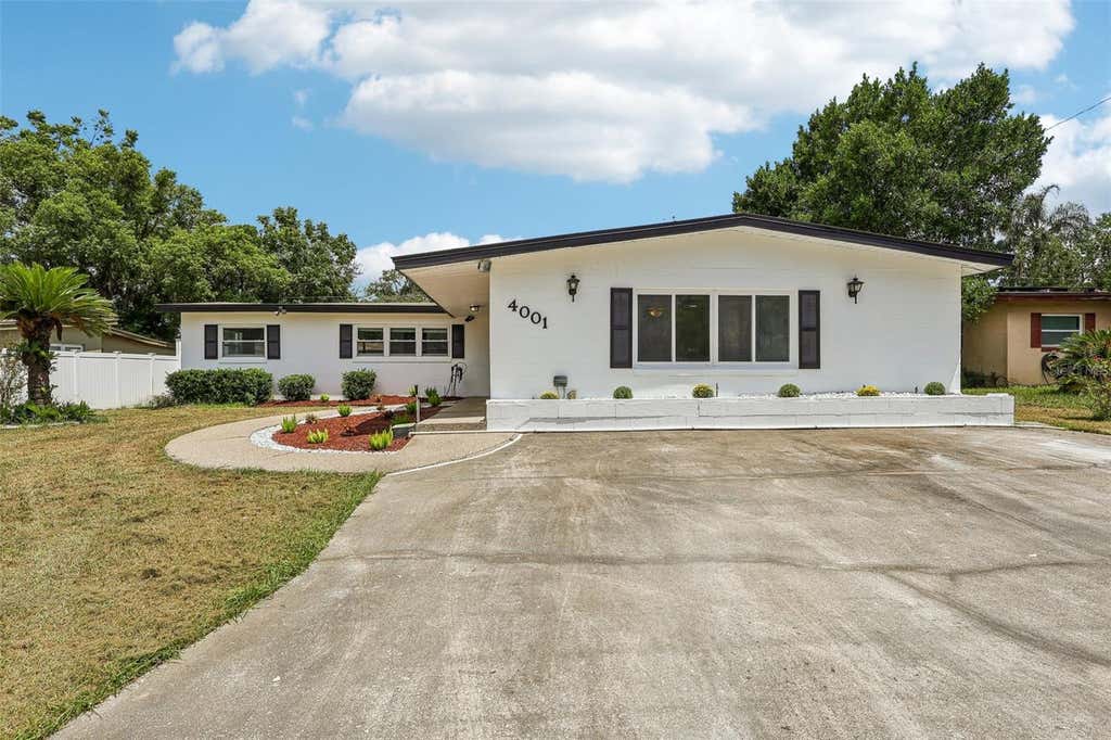 Photo of 4001 Timber Trl, Orlando, FL 32808 (MLS # O6437063)