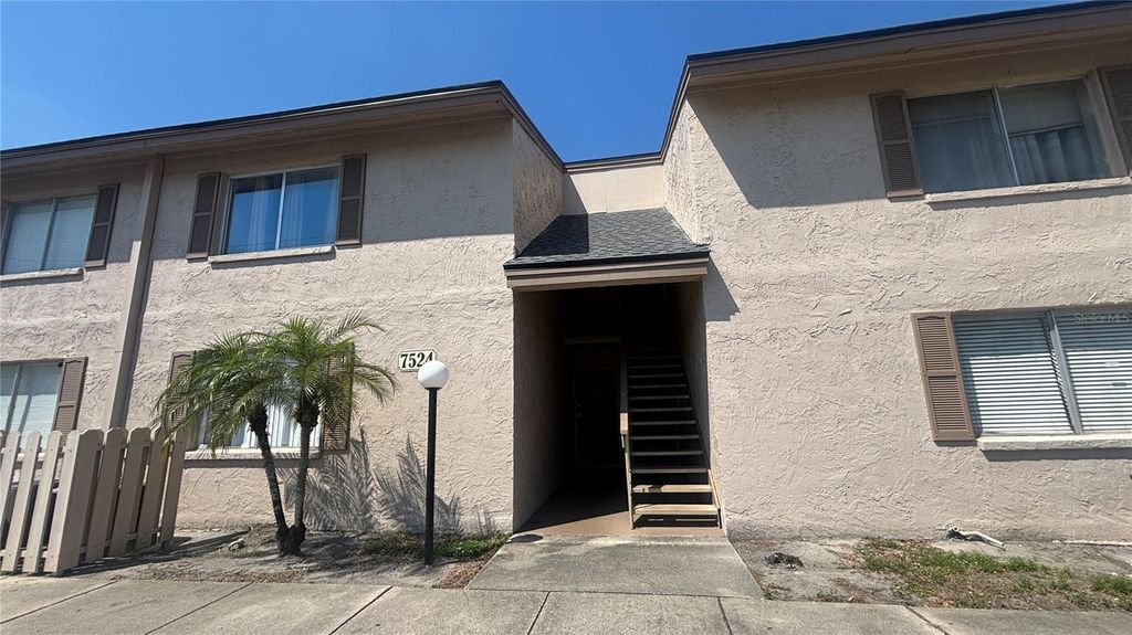 Photo of 7524 Needle Leaf Place #32, Tampa, FL 33617 (MLS # TB8490959)